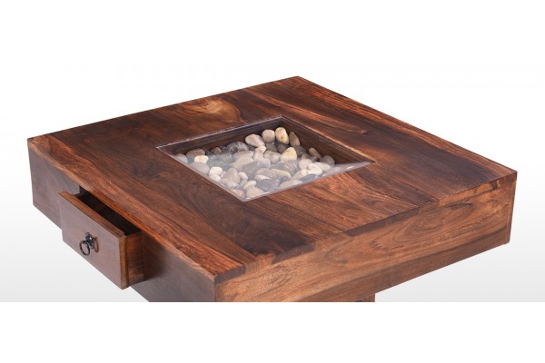 Glass coffee table with clearance pebbles